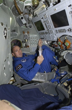 Figure 11.9. An astronaut is shown inside the Soyuz capsule (Courtesy of NASA).